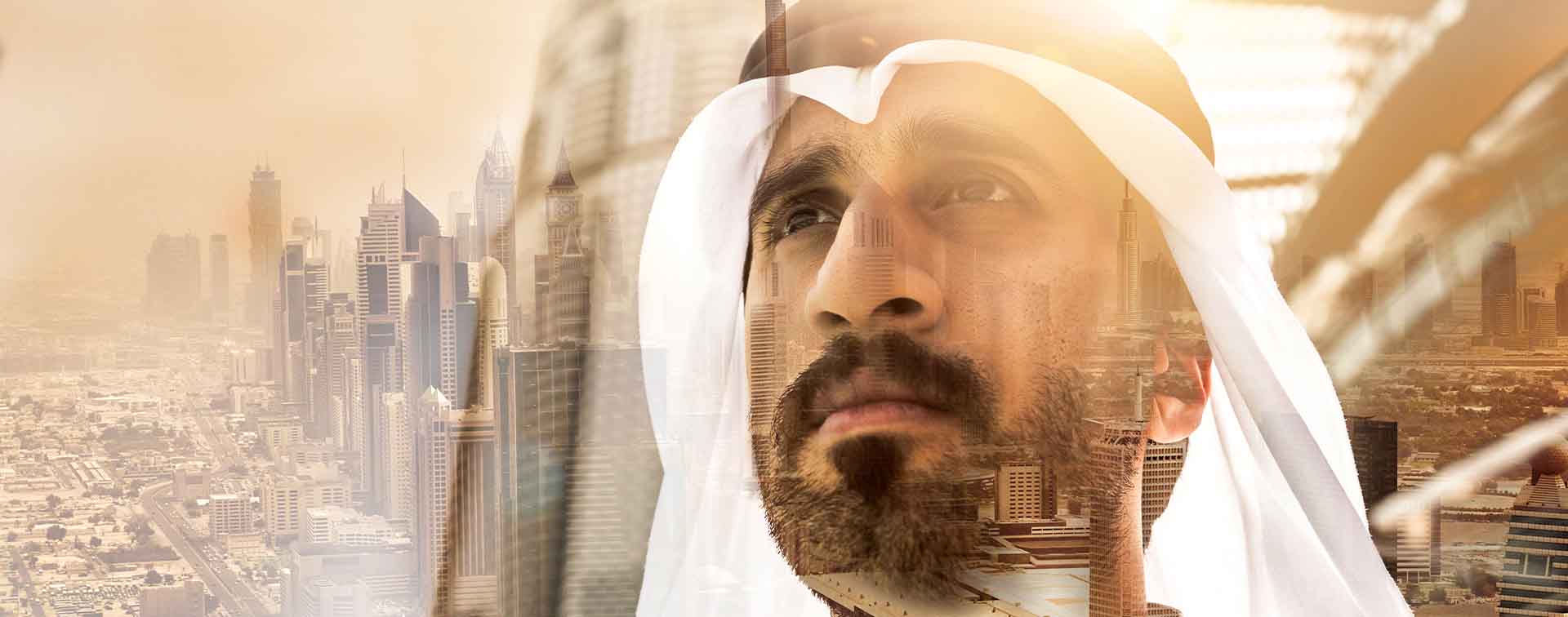 Digital composite of Middle Eastern businessman looking ahead contemplatively and a sprawling city
