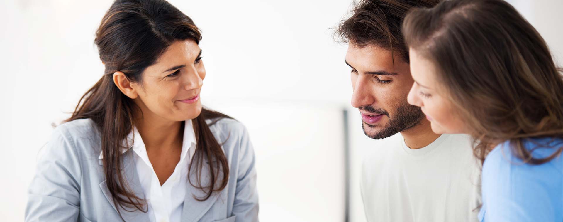 A couple consulting an advisor