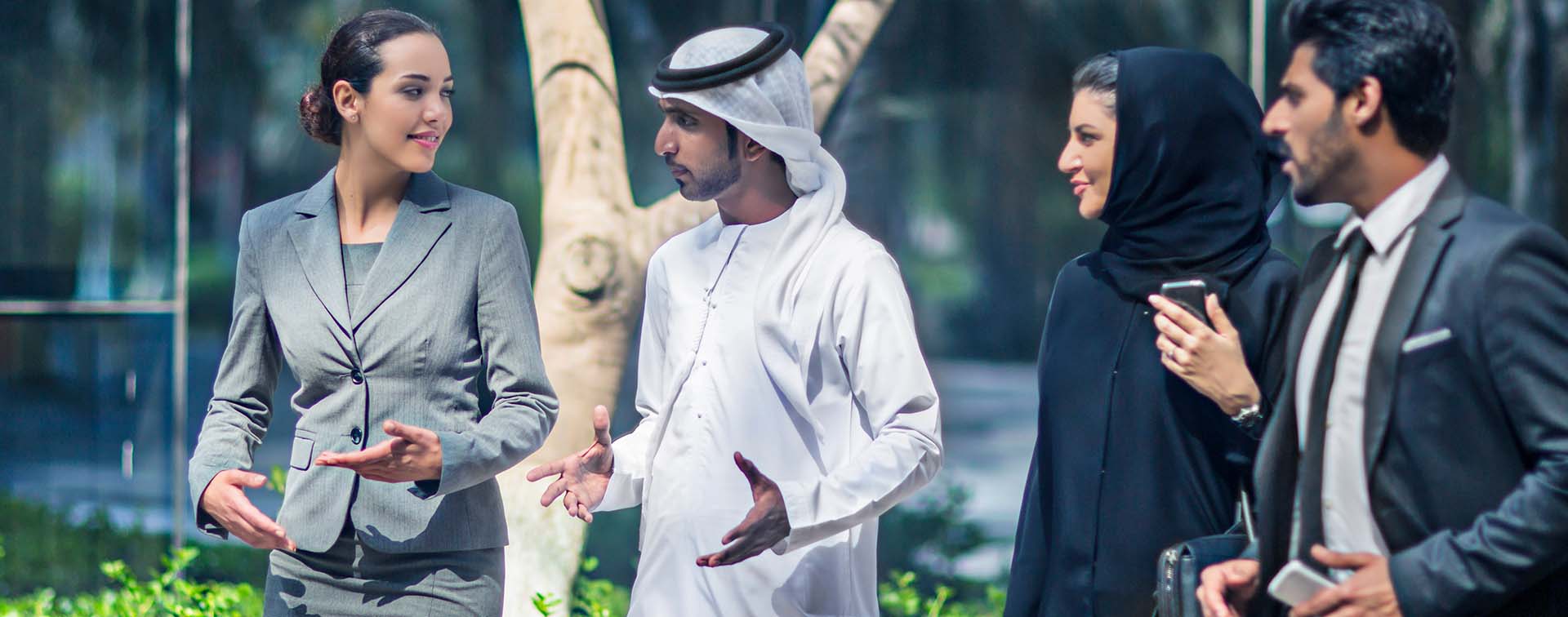 Middle Eastern businesspeople in discussion