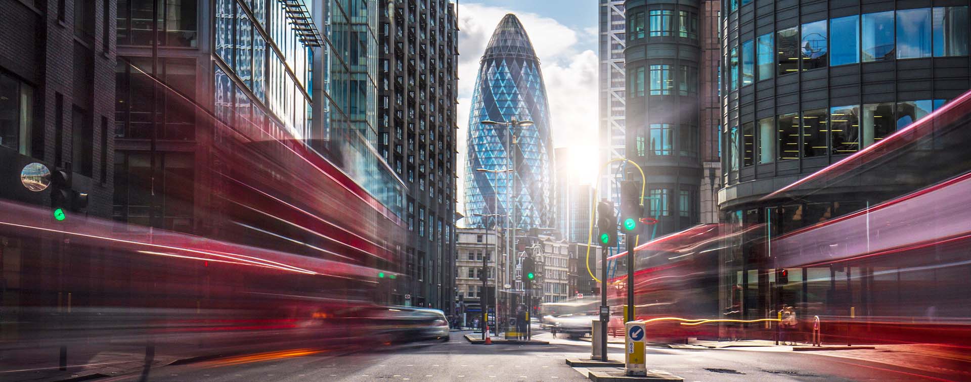 Fast-moving traffic on the streets of London’s financial district