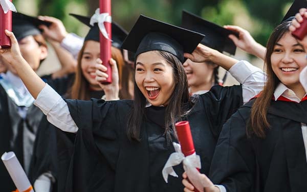 University students celebrating their graduation