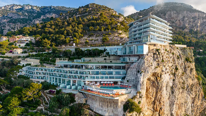 A building on a cliff AI-generated content may be incorrect.